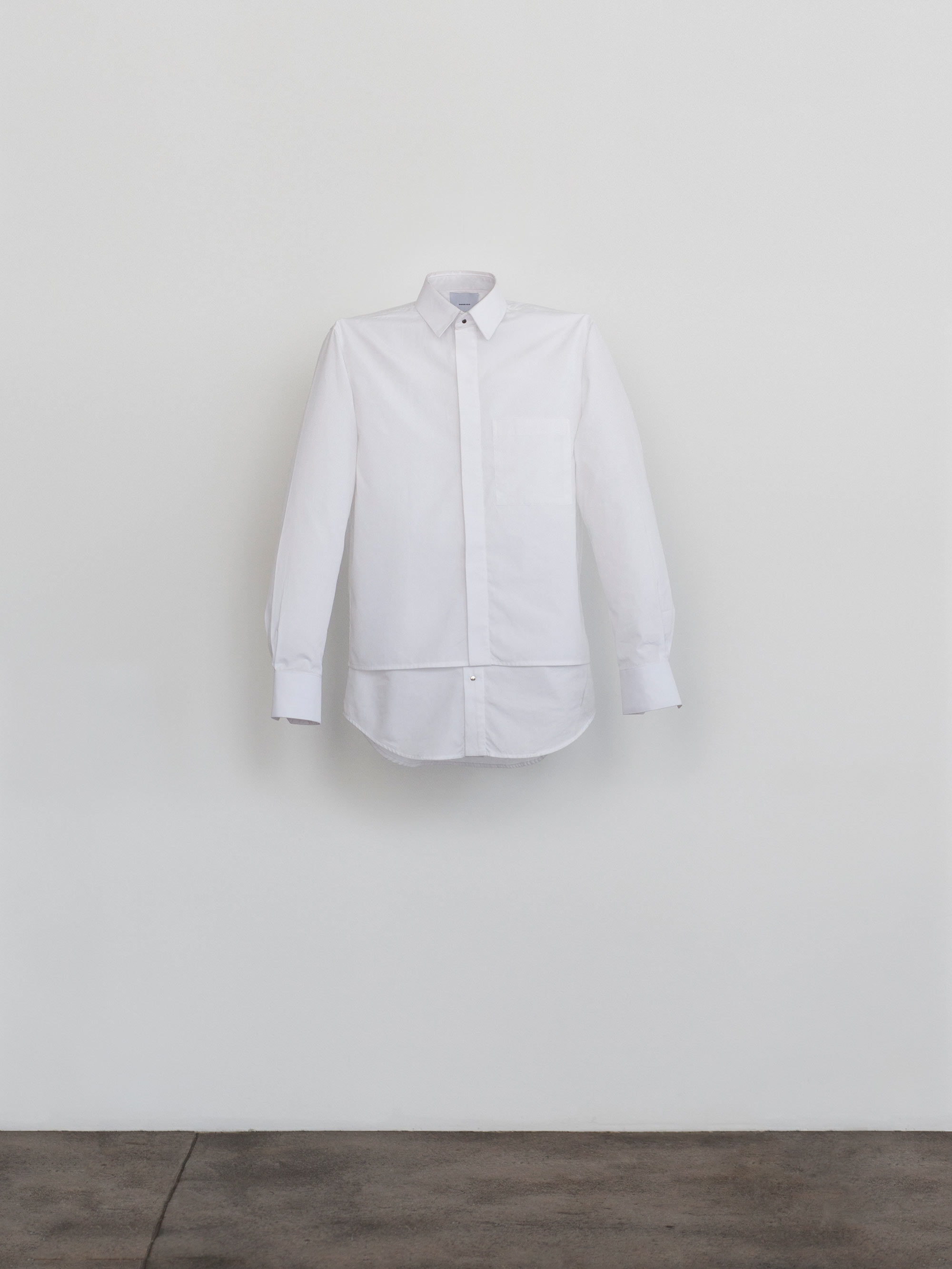 This white dress shirt is naturally suspended. It is not a photoshop effect.